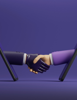 purple and black computer tablet with a hand shaking